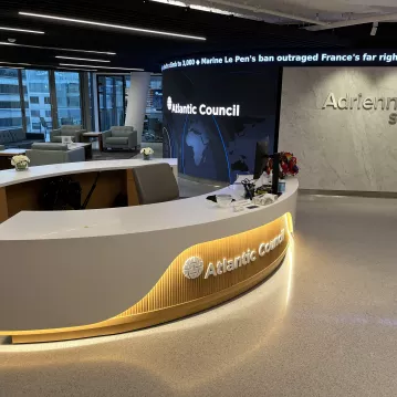 Atlantic Council HQ interior showing a reception desk and interior lights