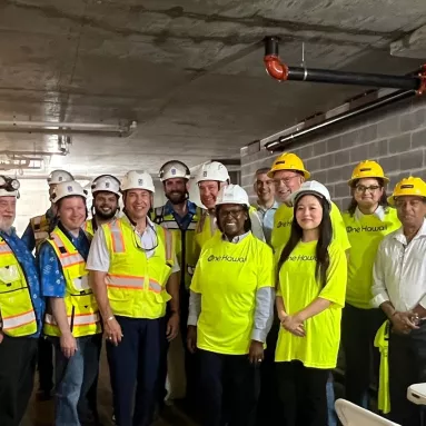 All smiles here with our One Hawaii project team, because we just celebrated topping out the new 4-s