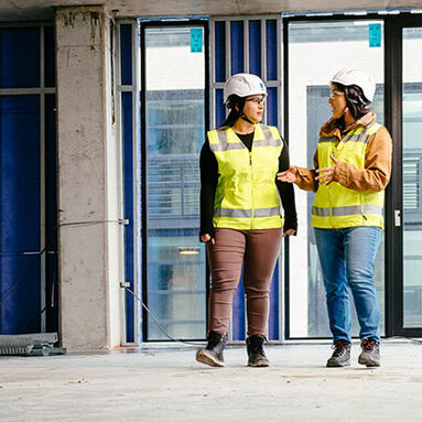 two construction women walking on site