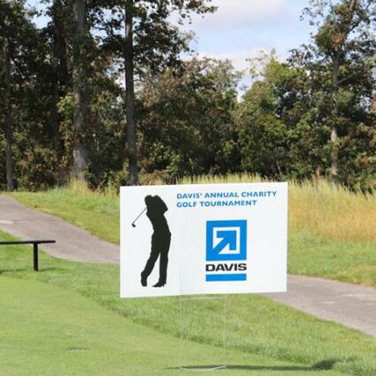 banner advertising golf tournament