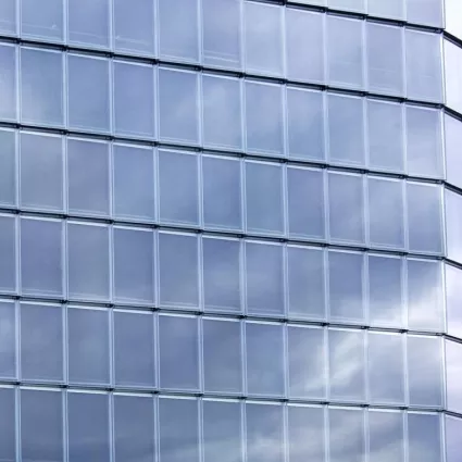 building with wall of glass windows