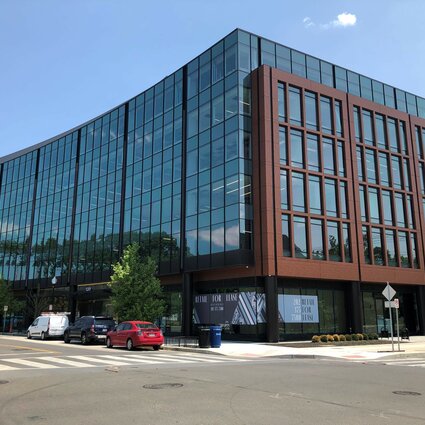 Exterior Shot of Parcel 17 at St. Elizabeth's - at the intersection of two roads, the glass facade sticks out!