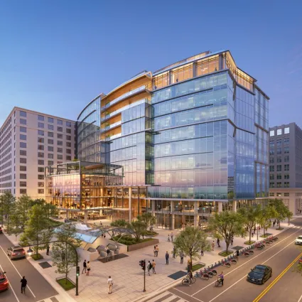 Rendering of a new trophy office building surrounded by sidewalks, roads and other buildings