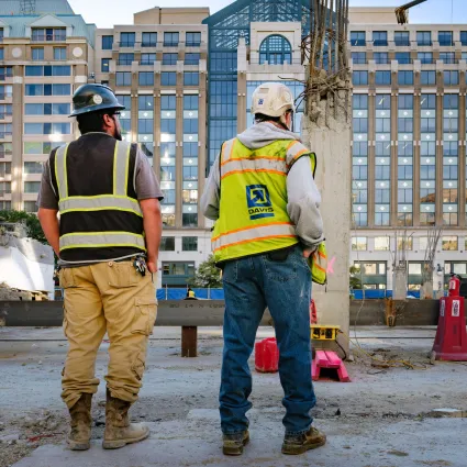 DAVIS employee looking onto jobsite