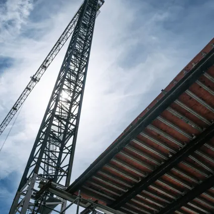 looking up at a tower crane