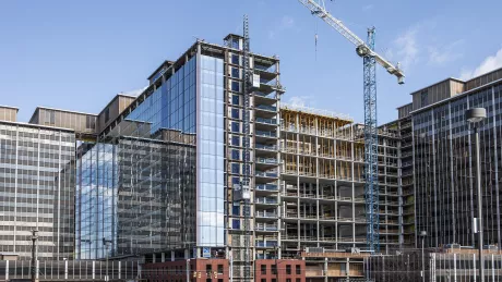 building being built with crane