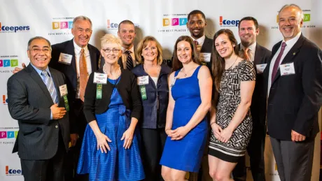 A group of david employees at event