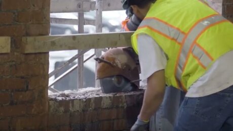 construction worker using wet method