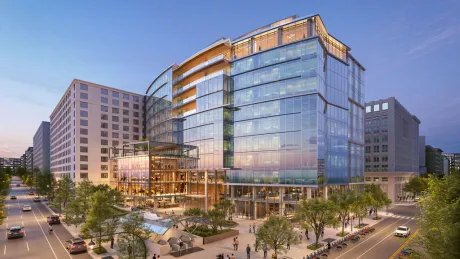 Rendering of a new trophy office building surrounded by sidewalks, roads and other buildings