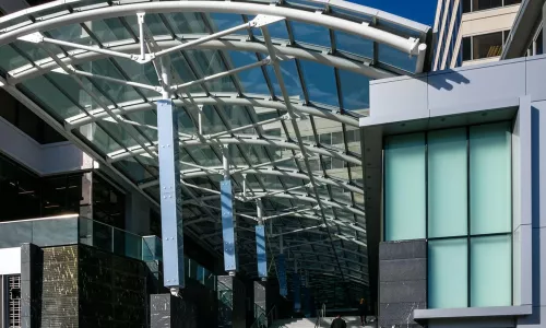 close-up view of glass ceiling with metal supports