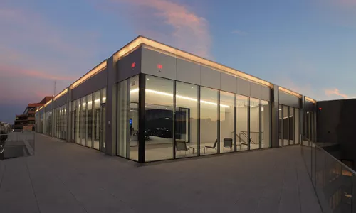 Exterior shot of a penthouse office space