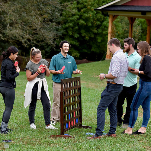Group playing connect four at DAVIS Fall Get Together event