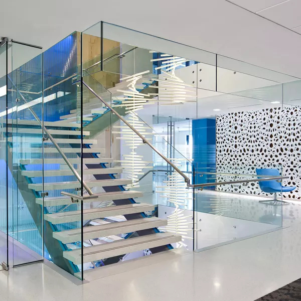 stairwell with sitting area on right