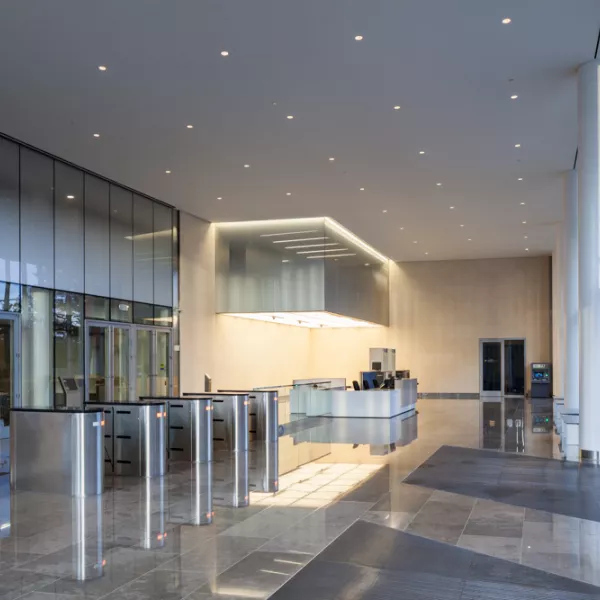 lobby of building with security kiosks
