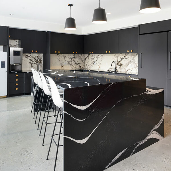 Kitchenette with black marble island 
