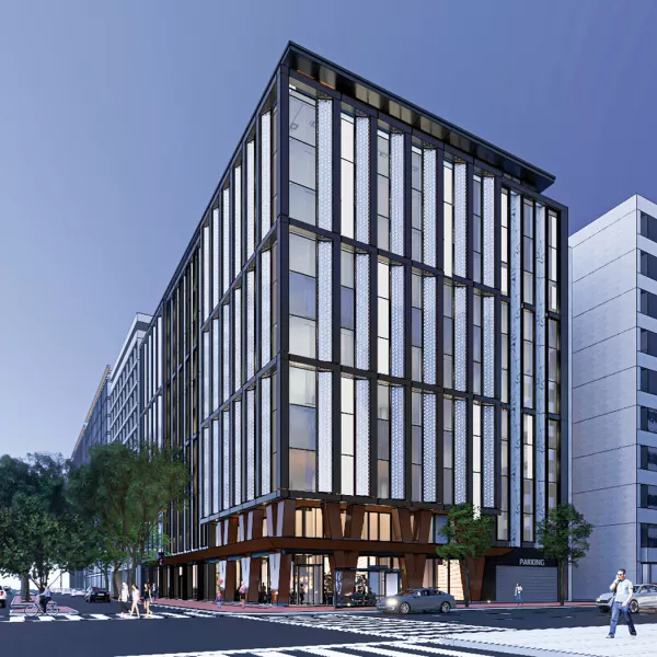 Exterior shot of an office building at night.