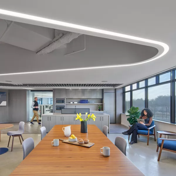 Modern office space with a table and chairs