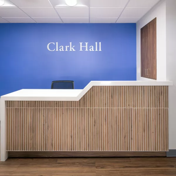 Interior of a dormitory labeled "Clark Hall"