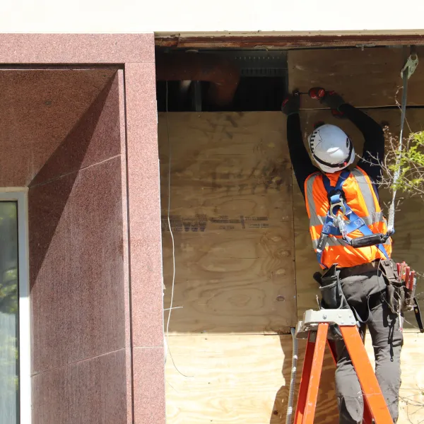 construction worker completing work on 601 Indiana