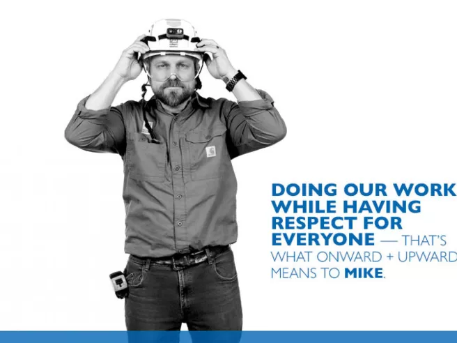 Mike Cavicchia, bearded man wearing hard hat.