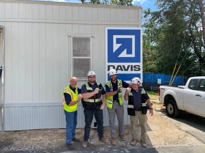 DAVIS employees flex for the camera.